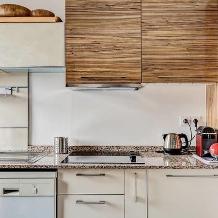 Appartement Des Toits - Welkeys Париж Екстериор снимка