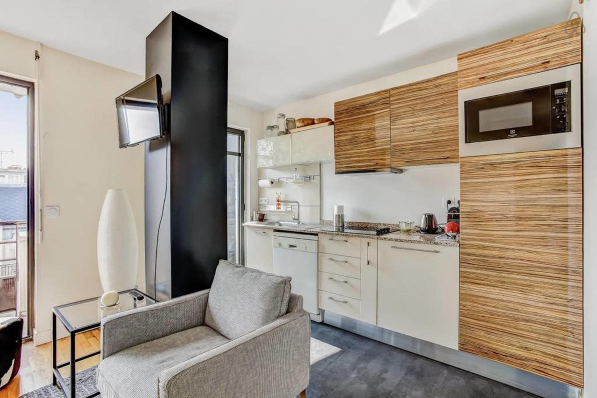 Appartement Des Toits - Welkeys Париж Екстериор снимка